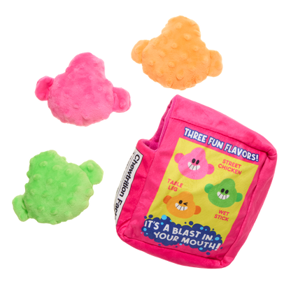 Achterkant van de snoepdoos met tekst over drie smaken en de snoepjes