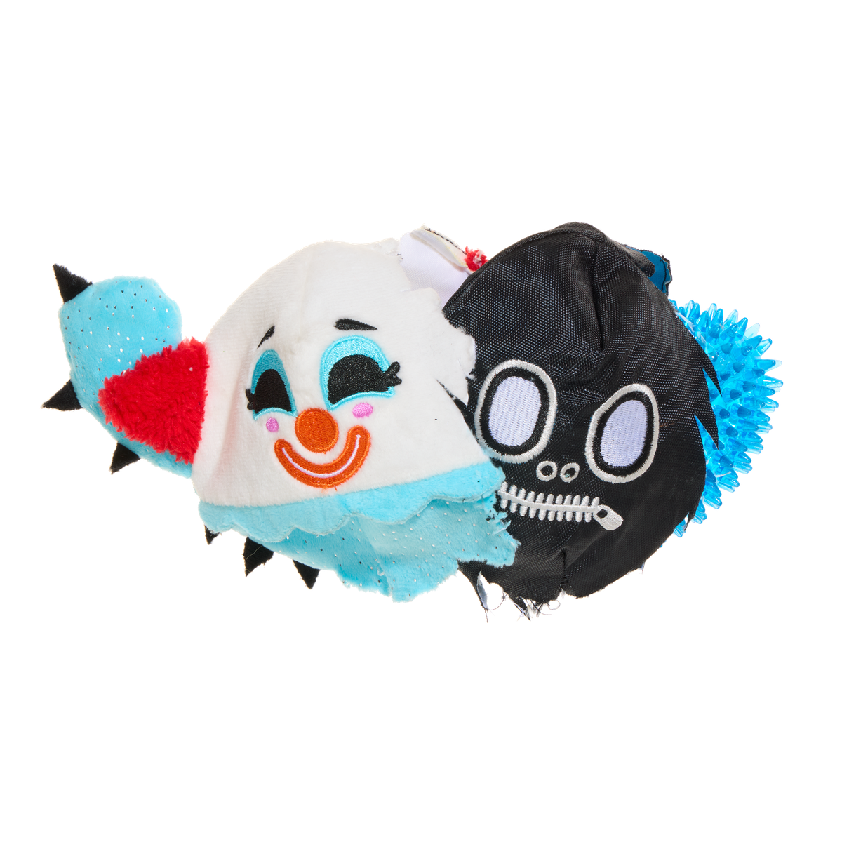 Opengeritste knuffel met zwarte doodshoofdbal en blauwe noppenbal erin