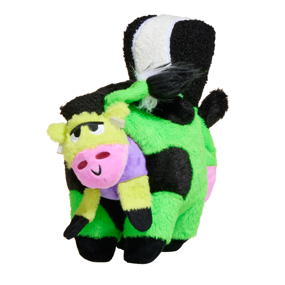 Kleine paarse koe zit vast aan de zijkant van de groene knuffel
