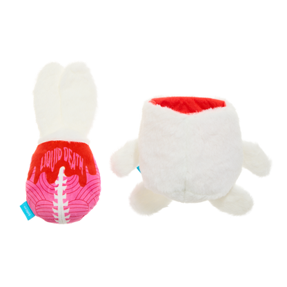 Achterkant van de roze binnenknuffel met tekst en het witte konijn