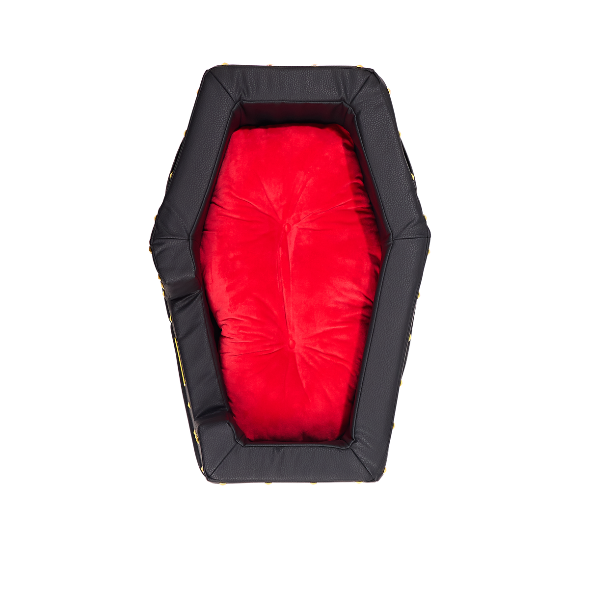 Bovenaanzicht van het doodskistvormige hondenbed met rood fluwelen kussen