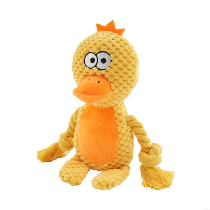 De knuffel als gele eend met oranje snavel, buik en kuifje